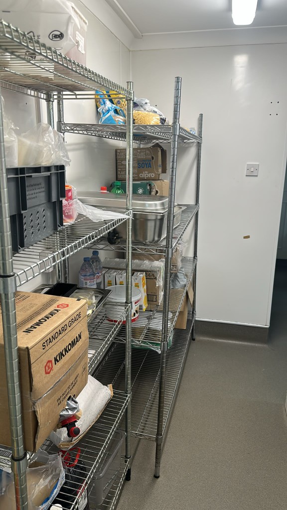 Dry store wire shelving with soy sauce and Alpro Soya