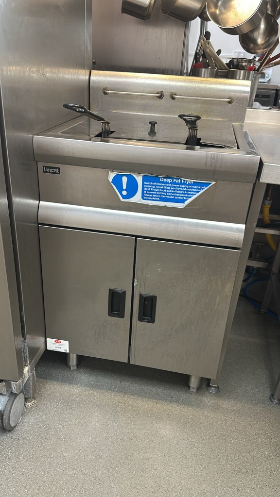 Lincat floor-standing fryer with two basket handles and safety sticker