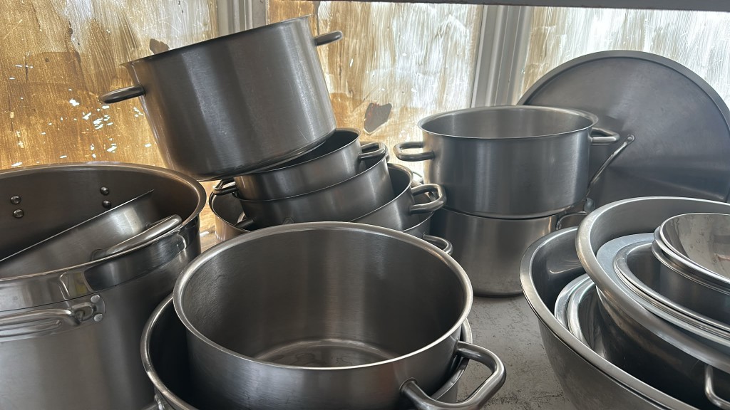 Stacked stainless pots and mixing bowls