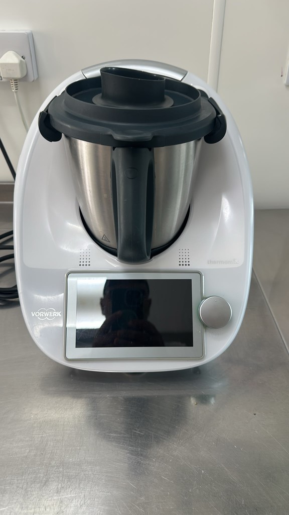 Vorwerk Thermomix TM6 on a stainless bench
